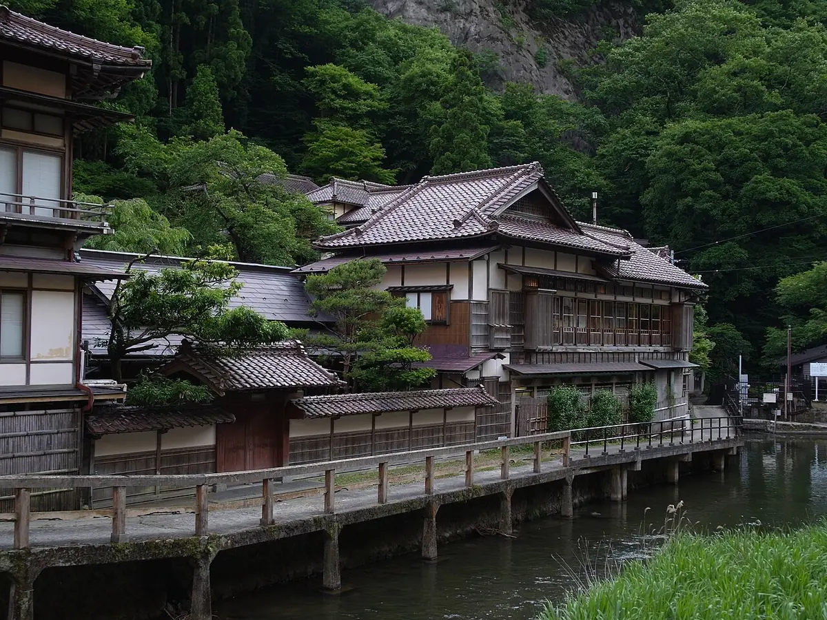 Traditional Mukaitaki ryokan beside the river in Higashiyama Onsen