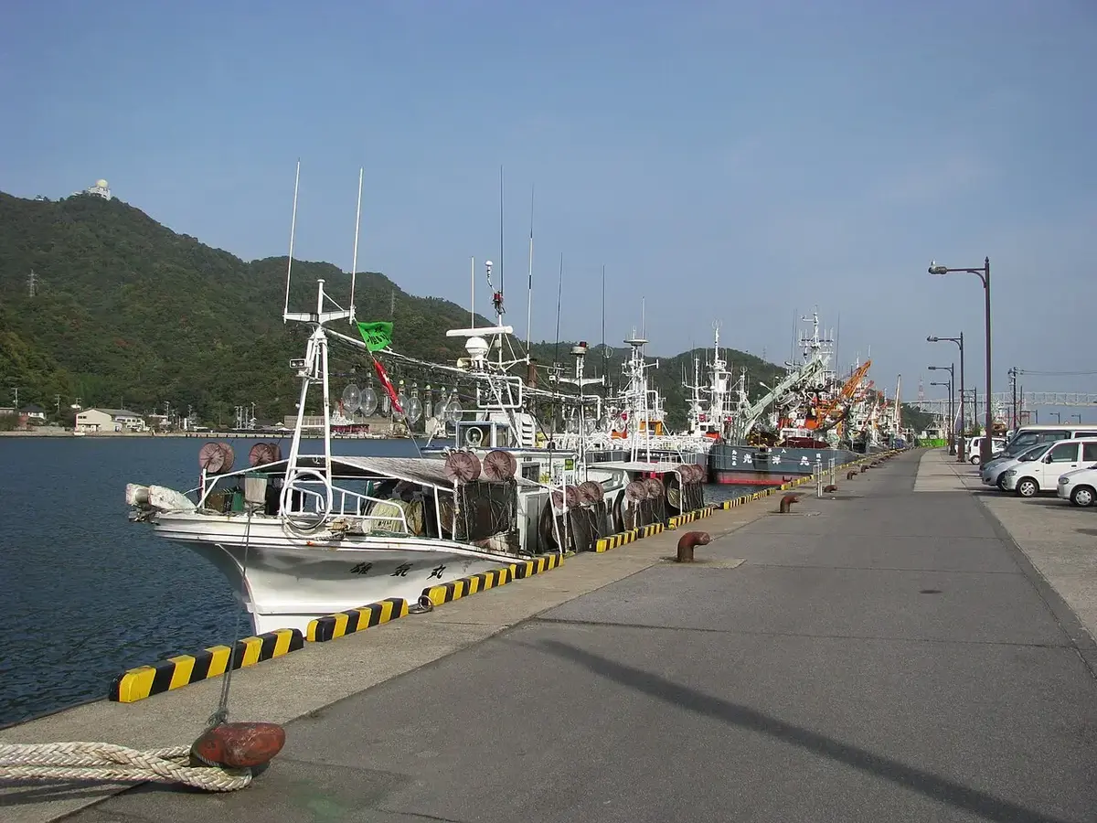 Fishing boats moored along the working harbor in Sakaiminato, Tottori
